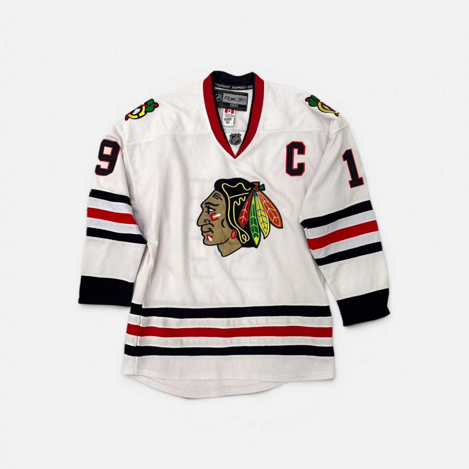 CHICAGO BLACKHAWKS #19 REEBOK NHL HOCKEY JERSEY L / 50
